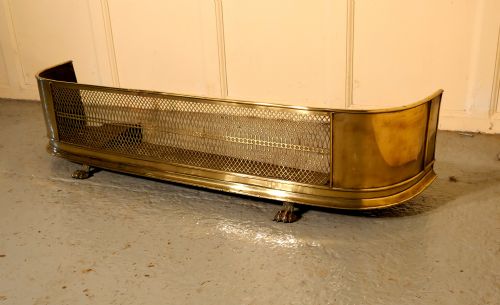 A Exceptional Georgian Pierced Brass Fender