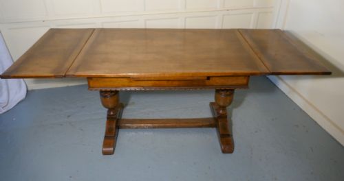 A Large Ipswich Oak Draw Leaf Table