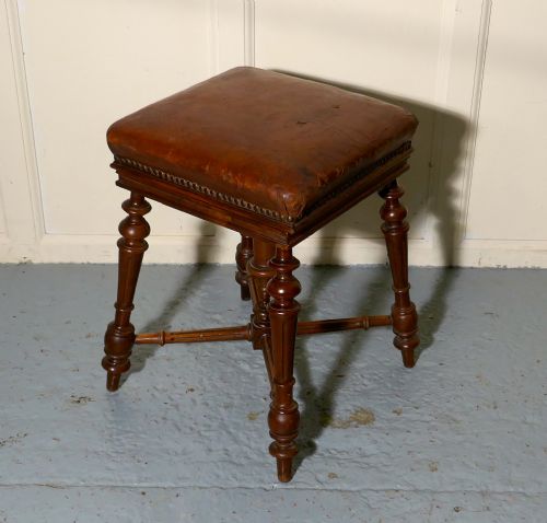A Rare French Square Walnut and Leather Revolving Piano Stool