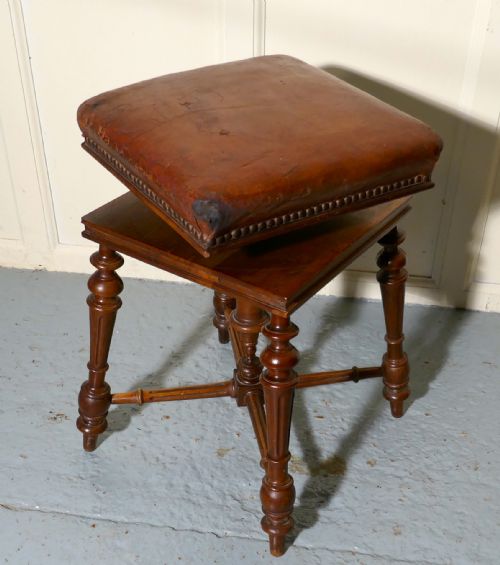 fig 1. A Rare French Square Walnut and Leather Revolving Piano Stool