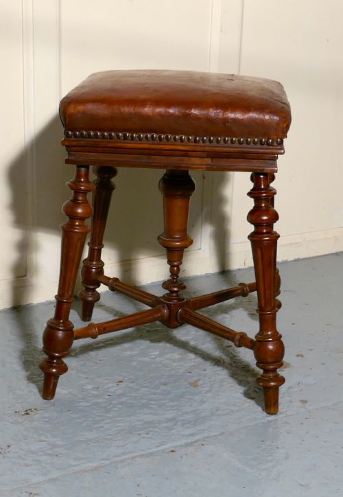 fig 3. A Rare French Square Walnut and Leather Revolving Piano Stool