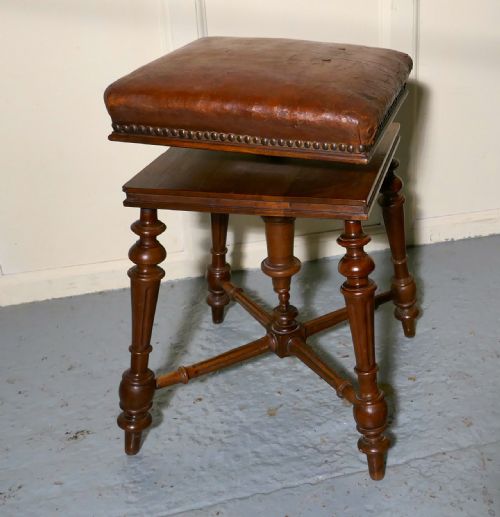 fig 4. A Rare French Square Walnut and Leather Revolving Piano Stool