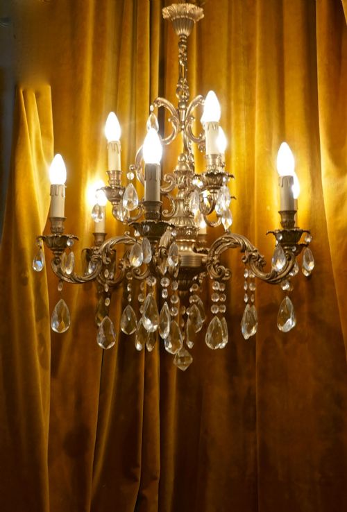 A Charming Large French Crystal and Brass 9 Branch Chandelier