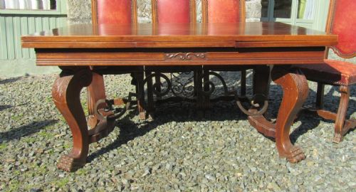 fig 1. A Large 19th Century Carved and Parquetry Oak Draw Leaf table