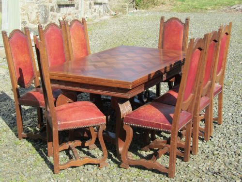 fig 2. A Large 19th Century Carved and Parquetry Oak Draw Leaf table
