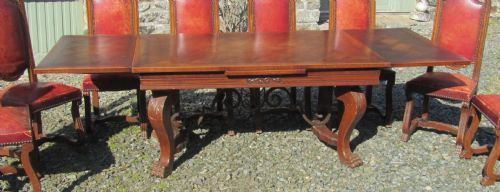 fig 3. A Large 19th Century Carved and Parquetry Oak Draw Leaf table