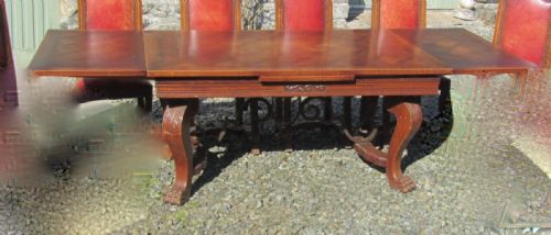 fig 5. A Large 19th Century Carved and Parquetry Oak Draw Leaf table