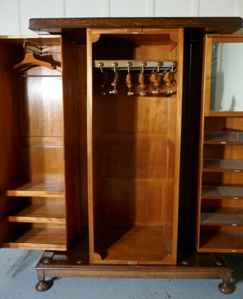fig 7. Metamorphic Gentlemans Triple Oak Wardrobe Compactum by Kean and Scott