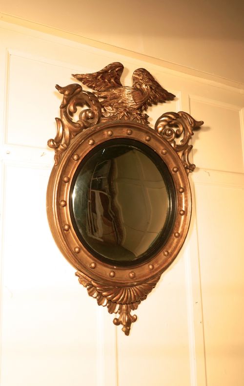 A Large Regency Convex Gilt Wall Mirror