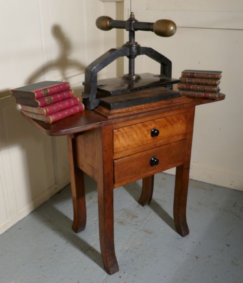 A 19th Century, Cast Iron Flower or Book Press, on Original Mahogany Table