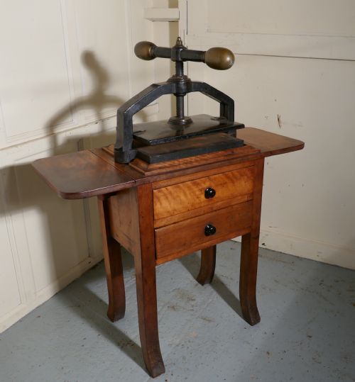 fig 1. A 19th Century, Cast Iron Flower or Book Press, on Original Mahogany Table
