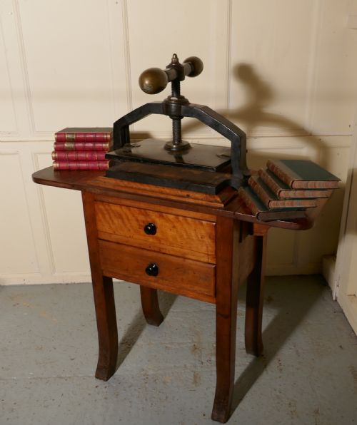 fig 2. A 19th Century, Cast Iron Flower or Book Press, on Original Mahogany Table