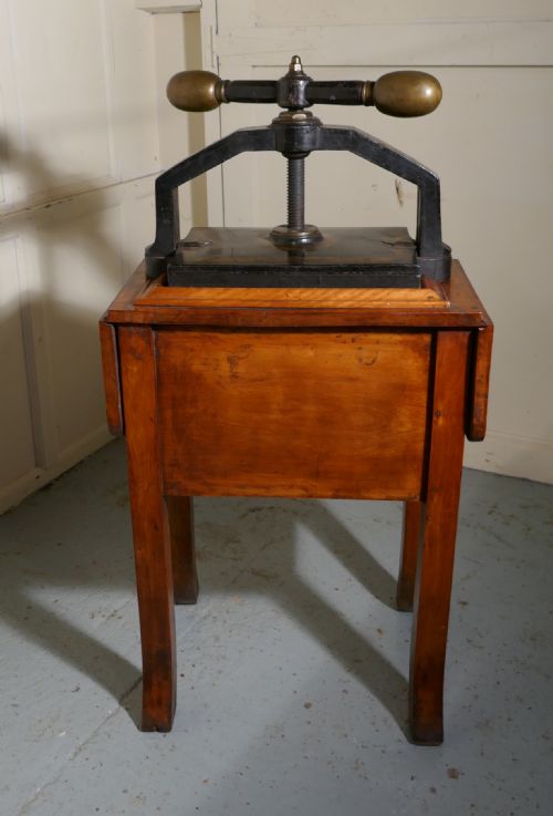 fig 4. A 19th Century, Cast Iron Flower or Book Press, on Original Mahogany Table