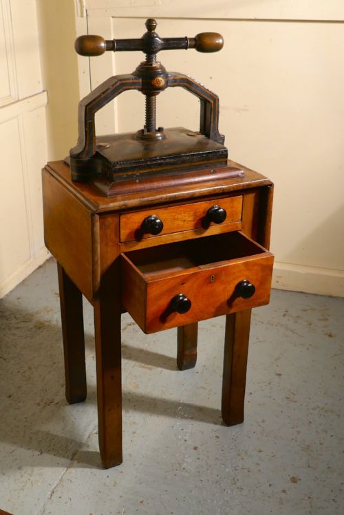 fig 2. A 19th Century, Cast Iron Flower or Book Press, on Original Mahogany Table