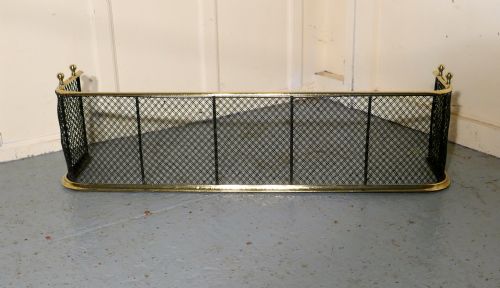 A Victorian Brass and Iron Club Fender