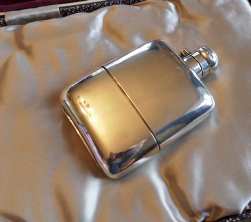 A Solid Silver Hall Marked Hip Flask and Cup by J Dixon, Sheffield 1909