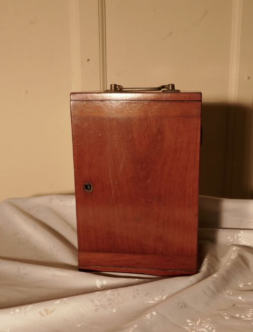 fig 1. A Victorian Monocular Microscope in a Mahogany Case