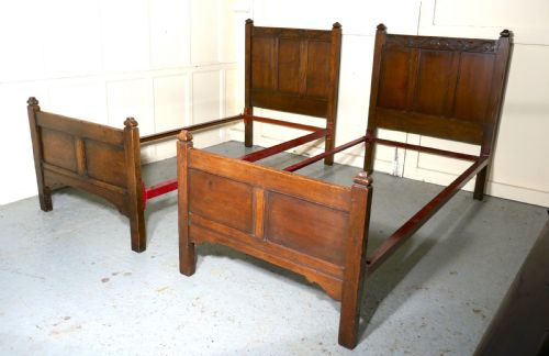 Pair of Arts and Crafts Gothic Oak Twin Beds