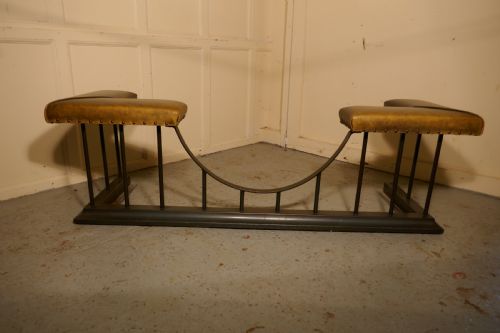 A Superb Very Large Iron and Leather Club Fender