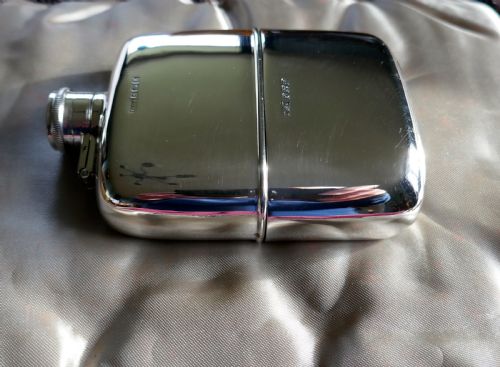 A Solid Silver Hall Marked Hip Flask and Cup by Daniel & Arter