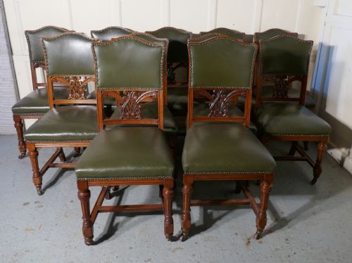 Set of 11 Arts and Crafts Golden Oak and Leather Dining Chairs