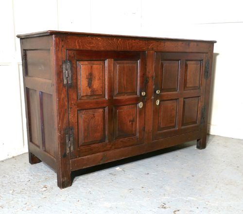 fig 1. A 17th Century Rustic Oak Dresser Base Cupboard