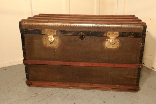 A Vintage Brass and Bound Canvas Travel Steamer Trunk