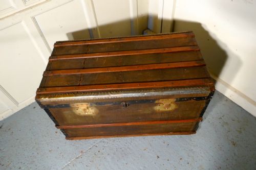 fig 1. A Vintage Brass and Bound Canvas Travel Steamer Trunk