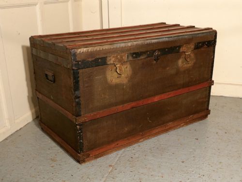 fig 3. A Vintage Brass and Bound Canvas Travel Steamer Trunk