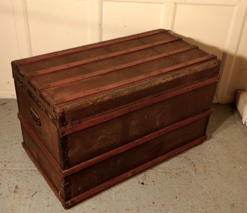 fig 4. A Vintage Brass and Bound Canvas Travel Steamer Trunk