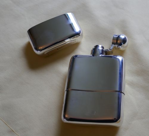 fig 1. A Solid Silver Hall Marked Hip Flask and Cup by Stewart Dawson & Co, 1912