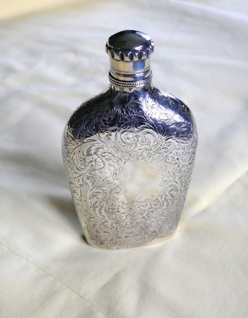 A Decoratively Engraved Victorian Silver Spirit Flask, Hilliard & Thomason 1861