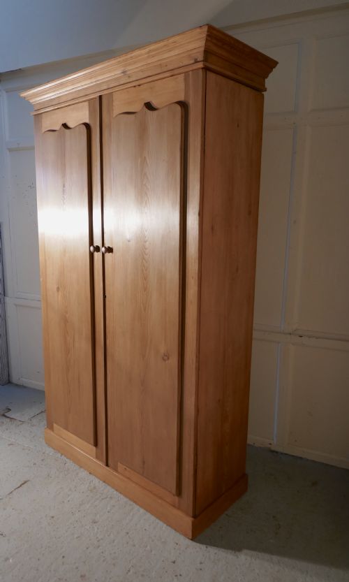 fig 3. An Early Victorian Stripped Pine Wardrobe