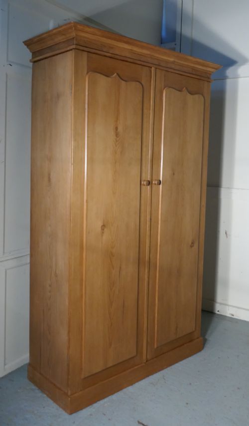 fig 4. An Early Victorian Stripped Pine Wardrobe