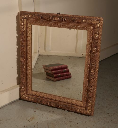 Early 19th Century Carved Wood Gilt Rococo Wall Mirror