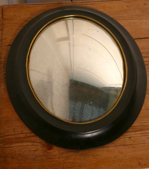 fig 1. Regency Style Ebonised Convex Oval Wall Mirror