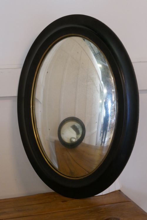 fig 1. Regency Style Ebonised Convex Oval Wall Mirror