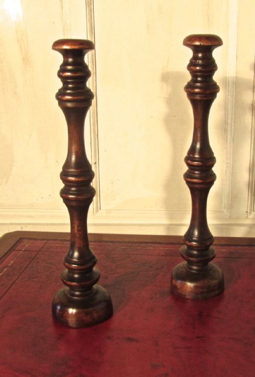 fig 1. A Pair of Tall Turned Wooden Wig Stands, shop display