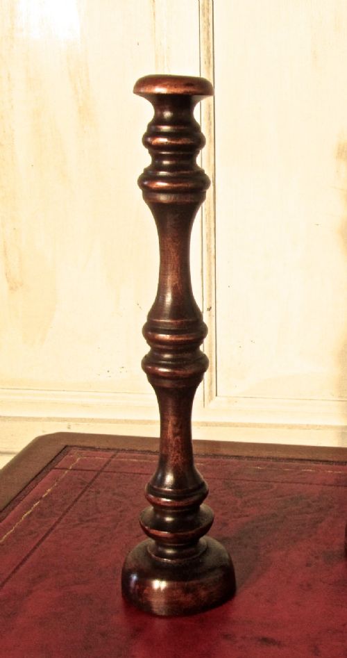 fig 3. A Pair of Tall Turned Wooden Wig Stands, shop display