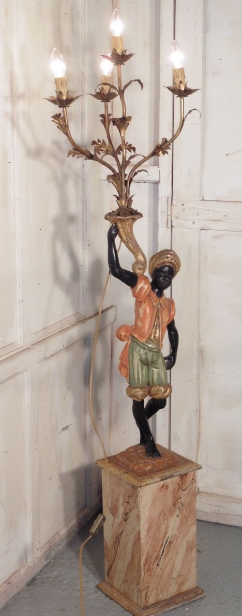 A Magnificent Venetian Blackamoor Candelabra
