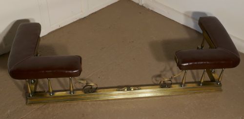 fig 1. A Large Arts and Crafts Brass and Leather Club Fender