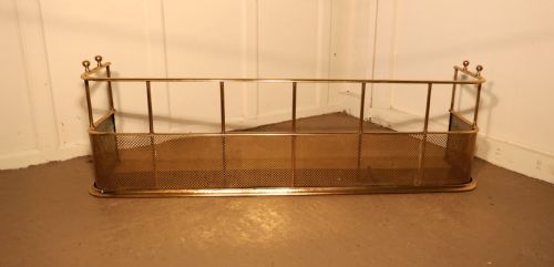 fig 3. A Large Victorian Brass Club Fender
