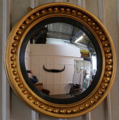 A Large Regency Convex Gilt Wall Mirror