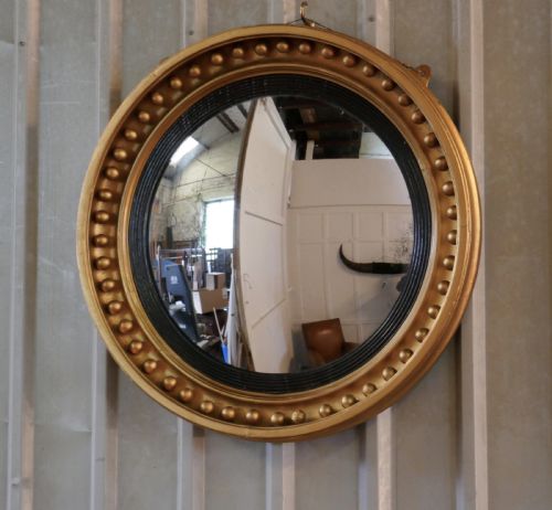 fig 1. A Large Regency Convex Gilt Wall Mirror 