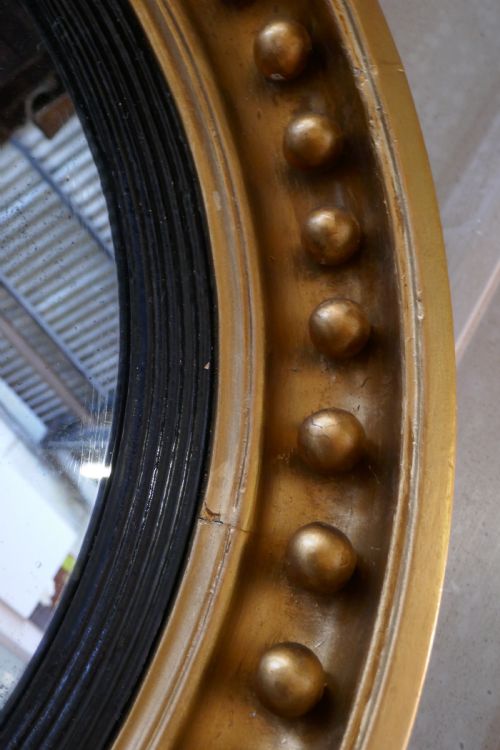 fig 3. A Large Regency Convex Gilt Wall Mirror 