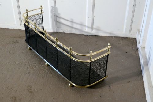 fig 2. An Early Victorian Brass and Iron Fender or Fireguard