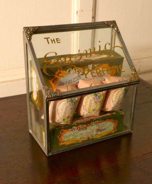 fig 2. Old Perfume, Chemist Shop Display Cabinet, Erasmic Soaps and Boxes