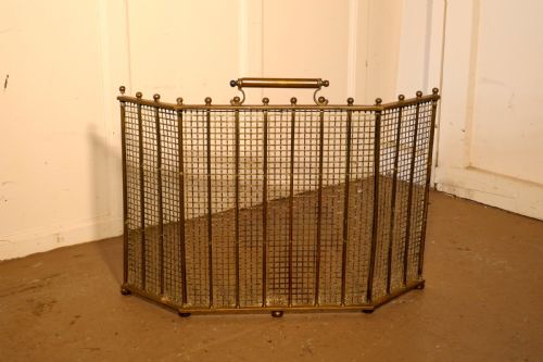 fig 2. Unusual Folding Brass Fire Guard