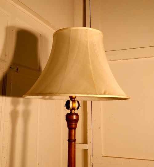 fig 1. A Carved Blonde Mahogany Floor Standing Lamp