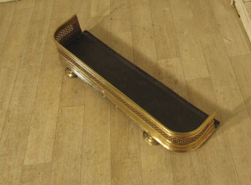 fig 1. A Small Georgian Pierced Brass Fender